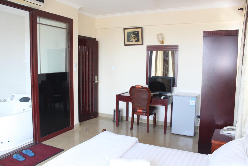 Mic Hotel Dar es Salaam Quarto foto