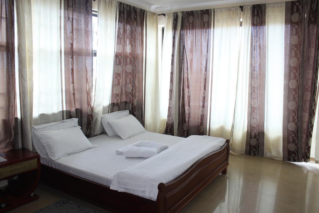 Mic Hotel Dar es Salaam Quarto foto