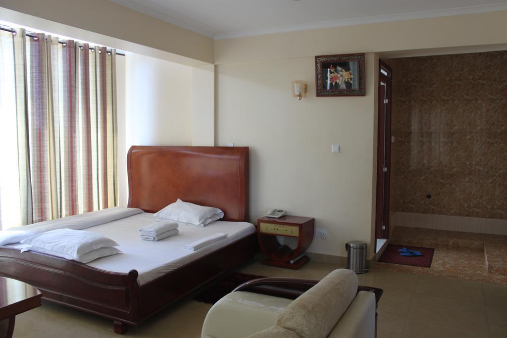 Mic Hotel Dar es Salaam Quarto foto