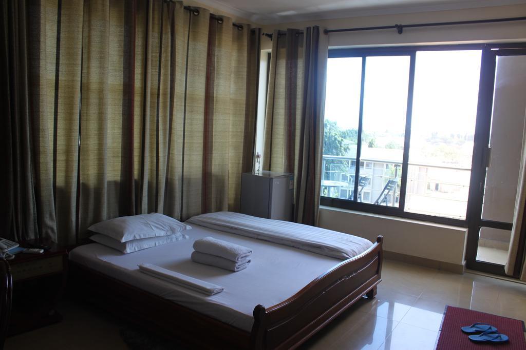 Mic Hotel Dar es Salaam Quarto foto